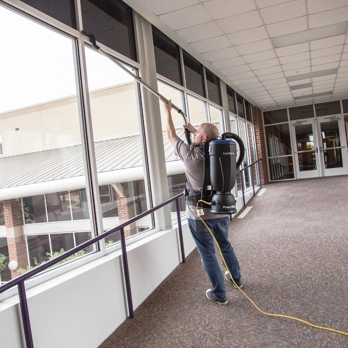 Powr-Flite Comfort Pro Backpack Vacuum 6 Quart - In Use - Windows